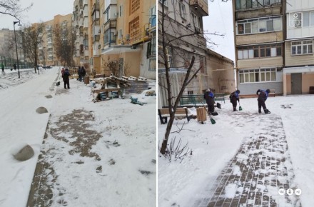 Во дворах мариупольских многоэтажек ведется уборка снега